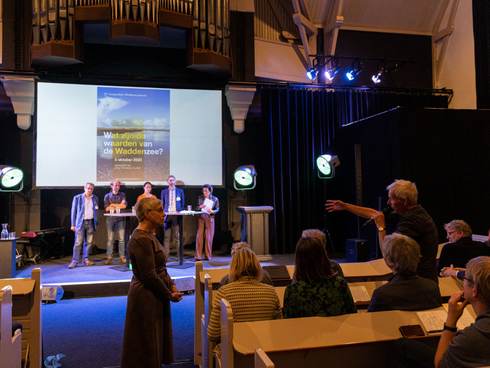 Paneldiscussie. Foto: Aron Weidenaar