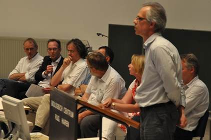 Het panel met de discussieleider Peter Herman