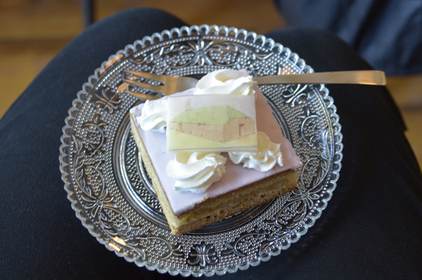 Coffee and a typical Frisian cake with a picture of the turf building